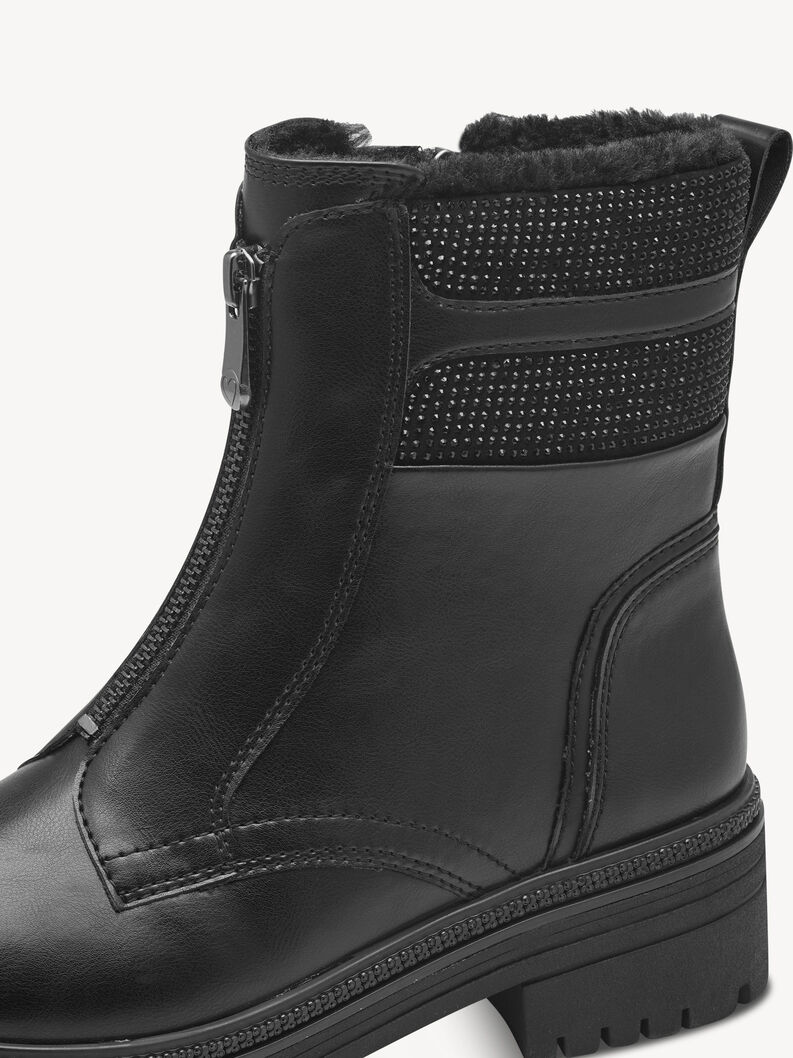 Detailaufnahme schwarzer Leder-Winterstiefel mit Steinen und Rei&szlig;verschluss vorne